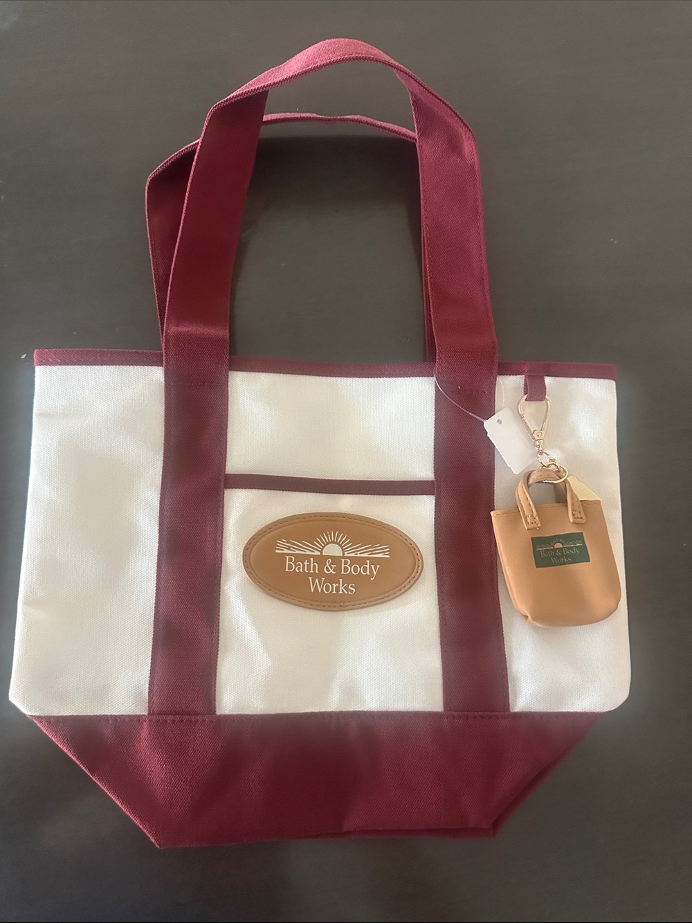 Bath & Body Works White and Burgundy Canvas Tote with Tan Charm